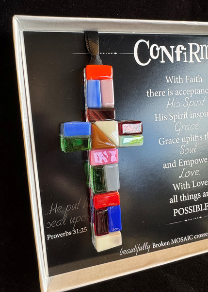 Colorful mosaic cross pendant on a card with text