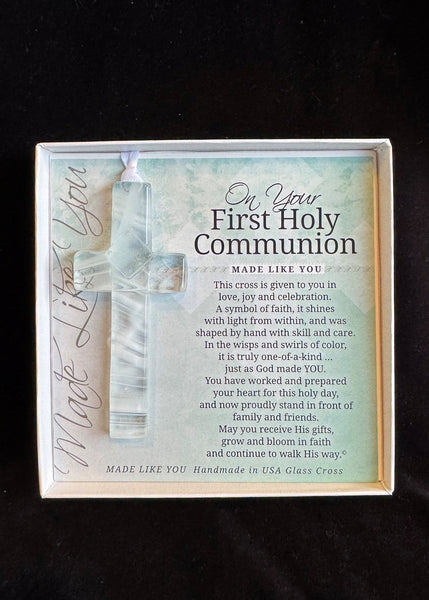 First Holy Communion cross with engraved message on a black background
